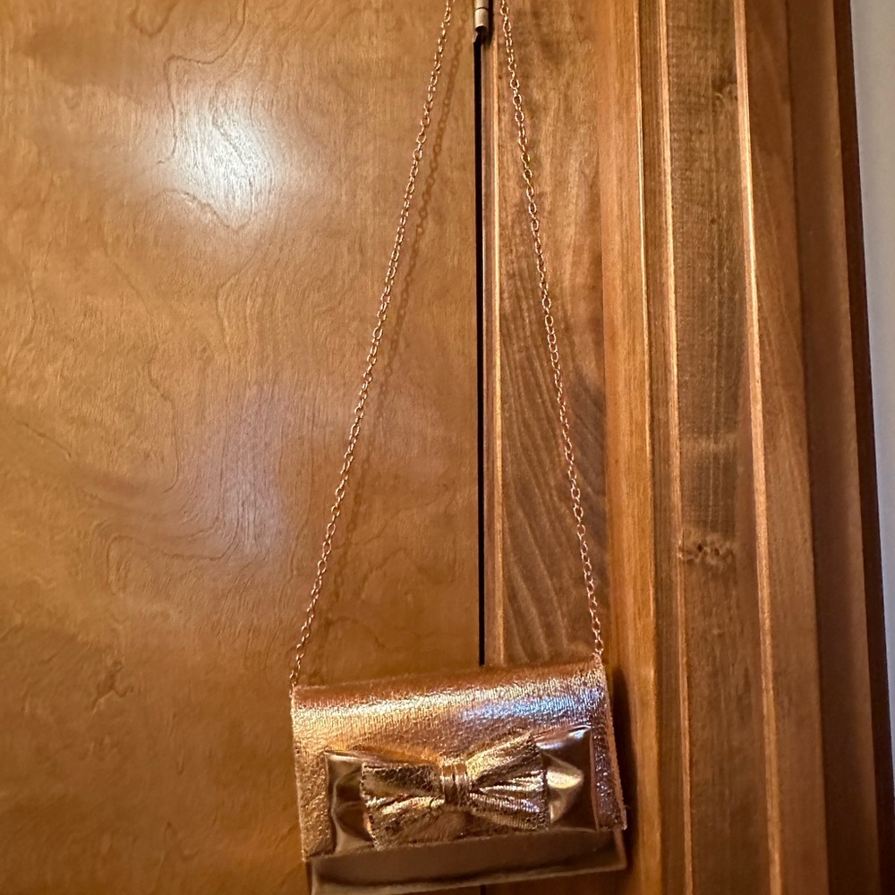 Charming Charlie Gold Bow Clutch Wristlet - Picture 2 of 4